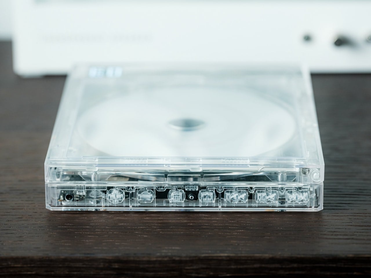 ClearFrame CD player on the background of the album cover
